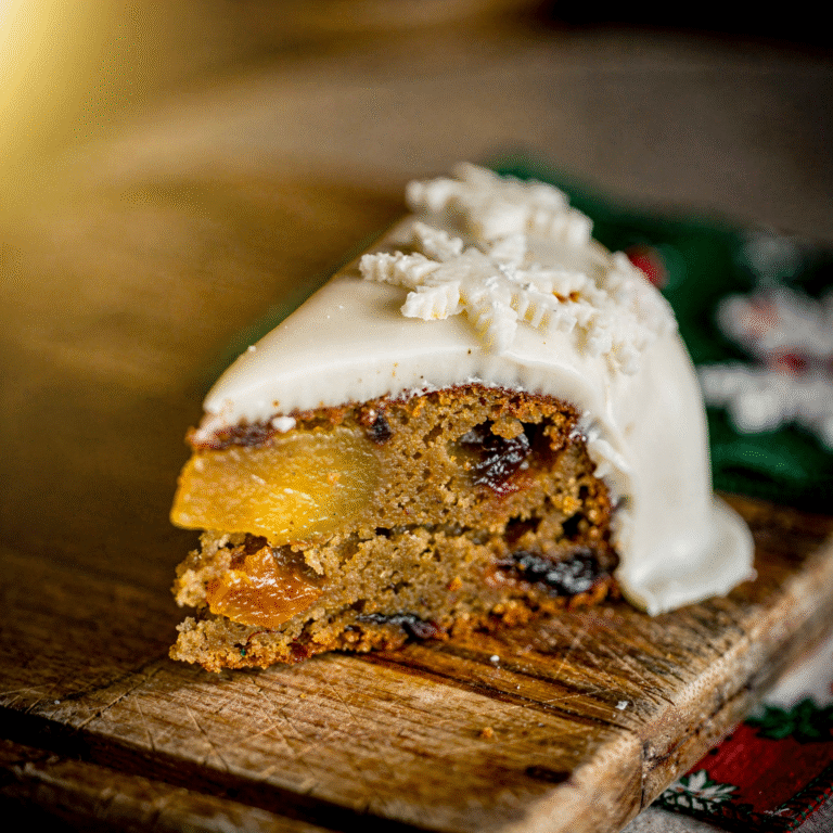 Easy Christmas Cake Decorating Ideas - single slice with fondant snowflakes, marzipan layer, close-up texture